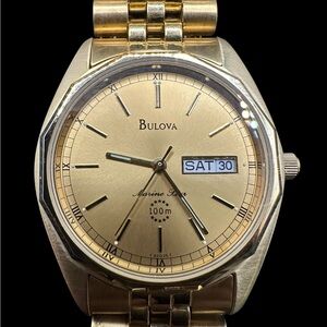 Bulova Gold Tone Marine Star with Day-Date Display. New old stock.